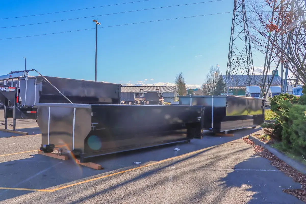 Roll-off dumpster ready for waste disposal at job site for 3 Yard Dumpster Rental in Jasper